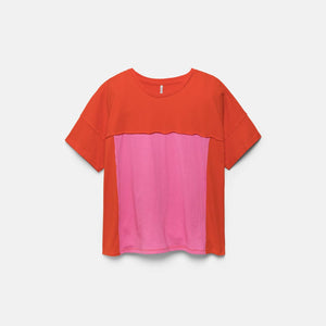 Two-tone red and pink shirt on a light gray background
